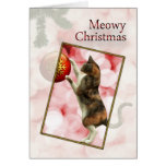 Navidad de Meowy con un gato juguetón Felicitación