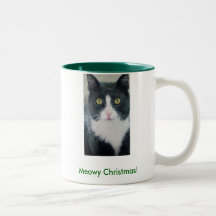 ¡Navidad de Meowy! Gato divertido de la taza del d