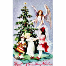 Navidad que saluda con los niños que juegan alrede esculturas fotográficas