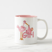 Niña rosada de la cigüeña taza