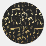 Notas musicales de oro sobre fondo negro etiquetas  