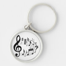 Notas musicales negras en forma oval llaveros