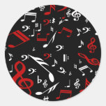 Notas musicales rojas y blancas sobre negro pegatina