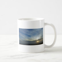 Nubes de la salida del sol tazas de café