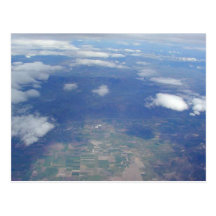Nubes de tierra del aeroplano tarjetas postales