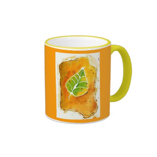 Nueva hoja en oro taza de café