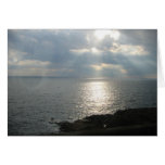 Océano y Sunrays romanos Tarjeta
