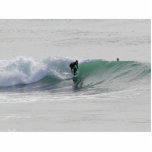 Olas oceánicas que practican surf a personas que p esculturas fotograficas