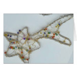 Ornamento del navidad de la estrella fugaz tarjeta