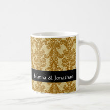 Oro elegante y taza negra del damasco del boda