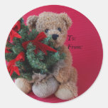 oso de peluche con los pegatinas de la etiqueta de