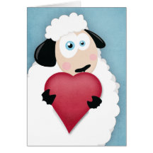 Ovejas lindas que sostienen tarjetas del amor de u