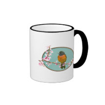 Pájaro de Oriole en rama con las flores de cerezo Tazas