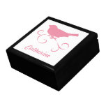 Pájaro rosado con la cinta cajas de regalo