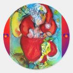 PAPÁ NOEL CON LA LINTERNA EN LA NOCHE DE NAVIDAD ETIQUETA REDONDA