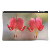 Pares de flores de los corazones sangrantes bolsos clutch