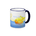 Pares de los pescados del oro taza de café