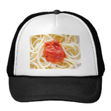 Pastas italianas de los espaguetis con el top de l gorros  