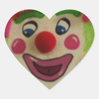 Cámbiale el avatar al usuario de arriba payaso_tonto_pegatina_en_forma_de_corazo