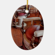 Peluquero - tenga por favor un asiento adornos
