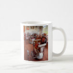Peluquero - tenga por favor un asiento tazas de café