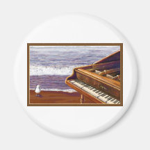 Piano en una playa imanes de nevera