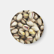 Pila de nuez del pistacho iman de frigorífico