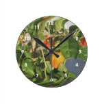 Pimientas del habanero en la piedra arenisca de la relojes de pared