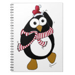 Pingüino del dibujo animado que lleva un sombrero  libros de apuntes