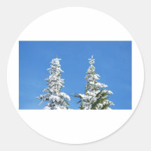 Pinos nevados pegatina redonda
