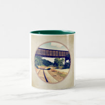 Pistas y caballete de ferrocarril tazas de café
