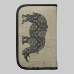 Planificador de la silueta de los rinocerontes del folios
