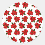Poinsettias del día de fiesta etiqueta redonda