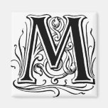 Ponga letras al ` M' en el negro - imán