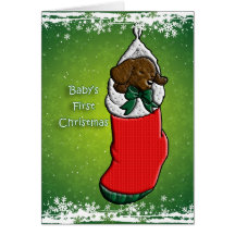 Primer perro de perrito del navidad del bebé en la tarjeta