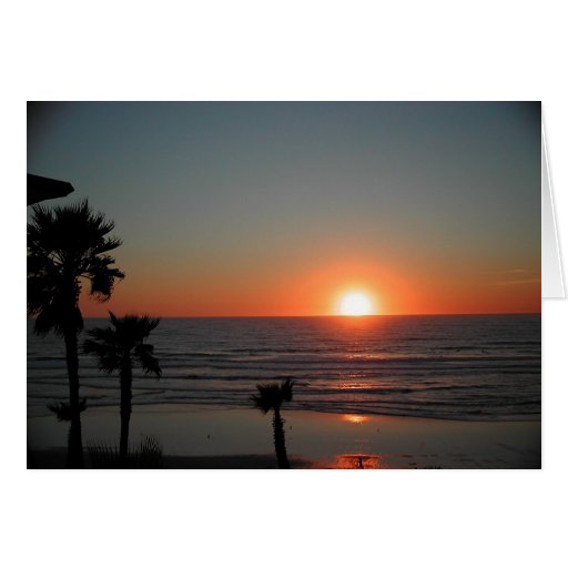 Puesta del sol de San Diego en la playa pacífica Felicitacion
