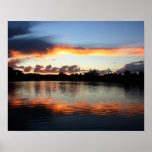 Puesta del sol del lago después de una tempestad d posters