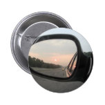 Puesta del sol en el espejo retrovisor pins