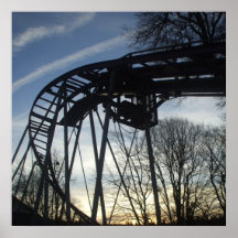 Puesta del sol en el parque de atracciones poster