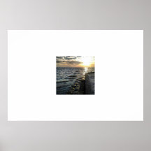 puesta del sol rocosa del océano posters