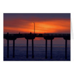 Puesta del sol sobre el puente tarjeta