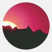 Puesta del sol sobre pico de los Badlands Pegatina
