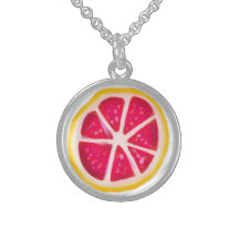 Rebanada amarilla del pomelo de la fruta cítrica d joyerias