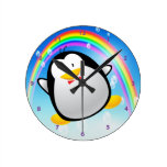 Reloj lindo del pingüino y del arco iris