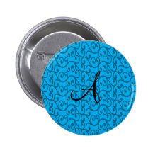 Remolinos del azul de cielo del monograma pin