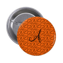 Remolinos del naranja del monograma pin