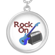 Roca en la guitarra y el amperio joyerias