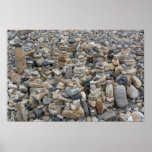 Rocas apiladas en la playa 2 posters