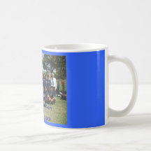Salida del sol de la foto del fútbol unida taza de café