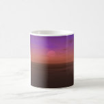Salida del sol sobre la taza de las nubes